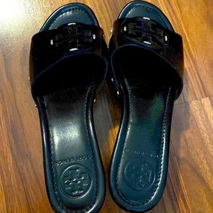 Black Tory Burch slide wedge. Either a size 6 or 6.5.